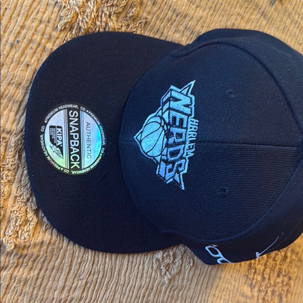 Black Snapback Cap with Embroidered Logo